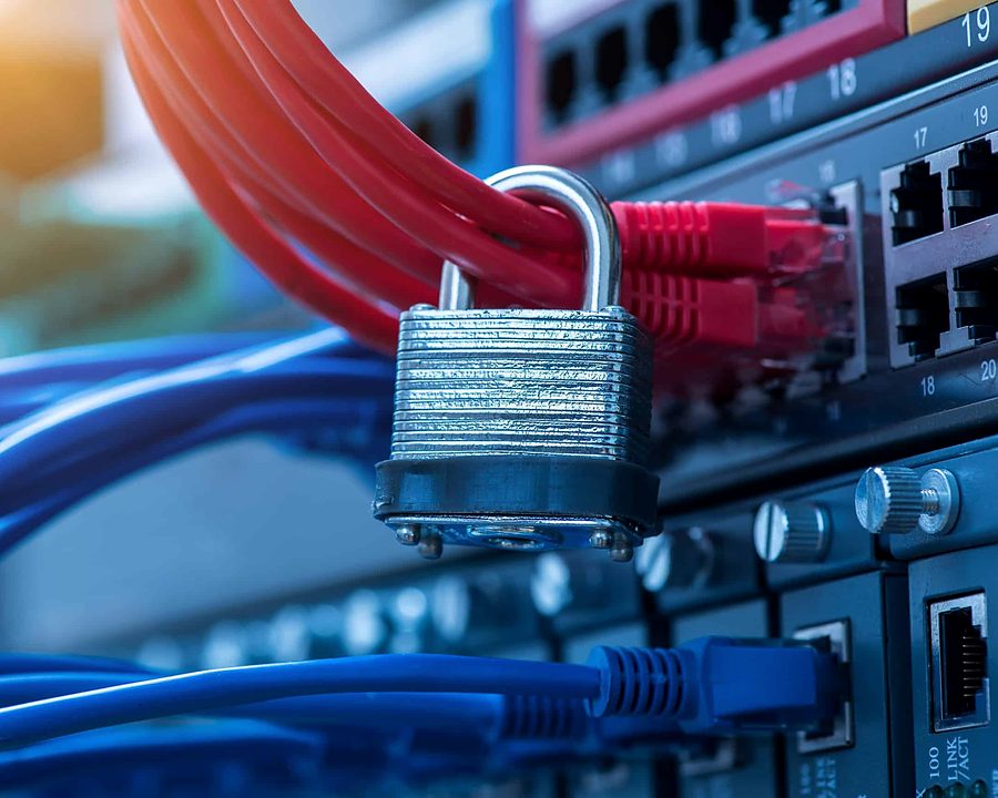 Network switch with patch cables secured by a padlock